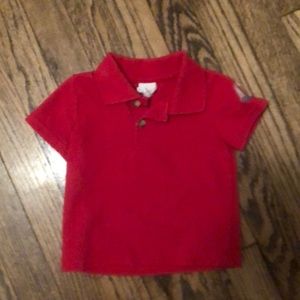 Red sailboat polo